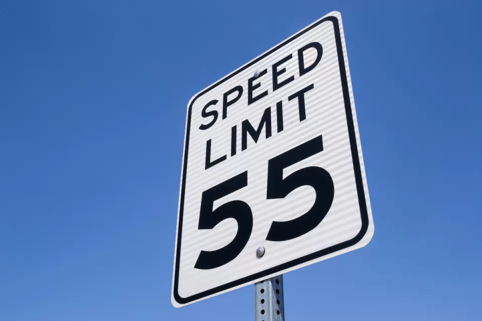 55 miles per hour speed limit sign.